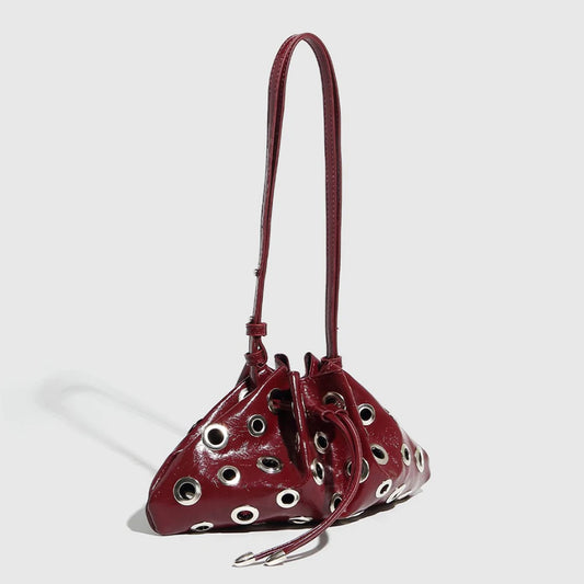 Sac seau mini en similicuir ajouré avec rivets décoratifs
